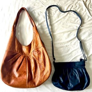 Leather bag duo. Tan shoulder bag and navy crossbody bag.